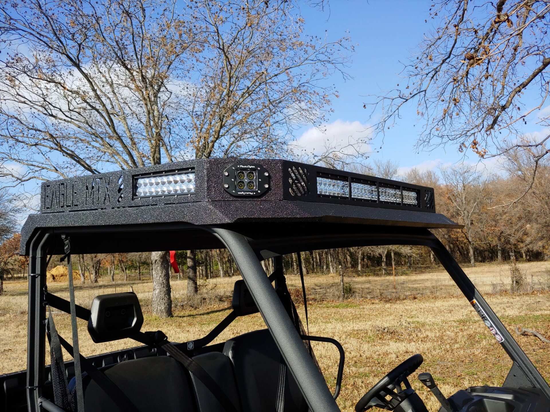 A utv with a light on top of it.