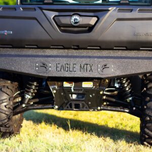 The rear end of a black utv with the word eagle on it.